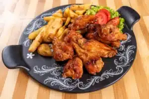 Bbq chicken wings roast potatoes and kachumbari